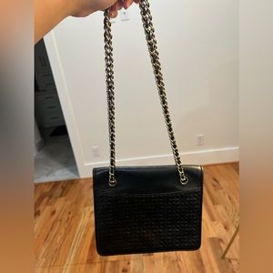 Pre-owned authentic Tory Burch bag with back pocket